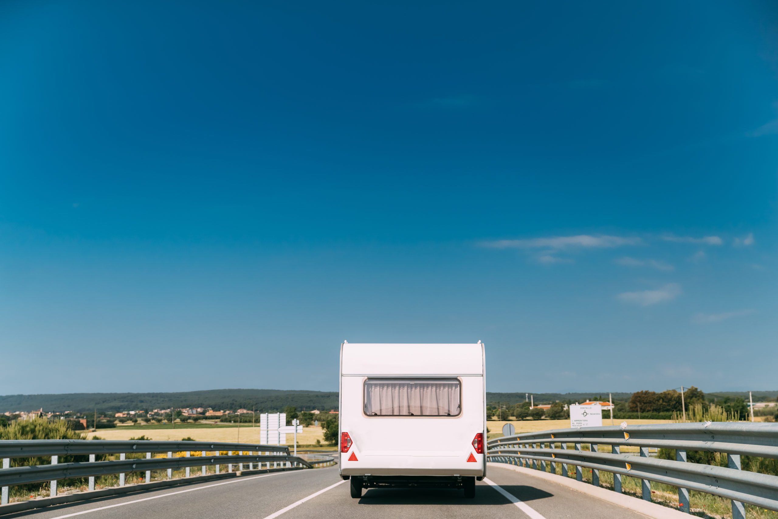 White Colour Motorhome Car Goes On Motorway Road